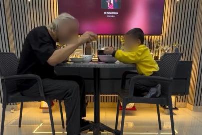 İzmir’de çocuğunu alkol masasına oturtan baba adli kontrolle serbest