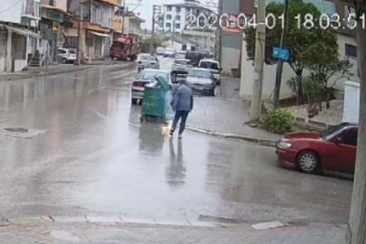 Çöpe atılacak batarya işletmecinin elinde patlayarak alev aldı