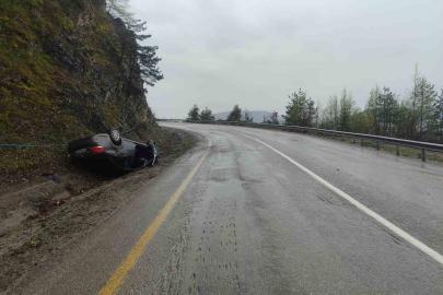 Takla atan otomobilden yara almadan kurtuldu