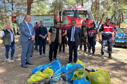 Burhaniye’de orman yangınlarına karşı ormanda çöp toplama etkinliği yapıldı