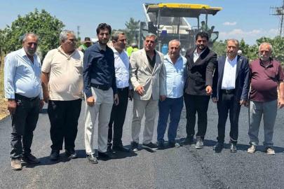 Yoğun yağış döneminde tahrip olan yollar asfaltlandı, vatandaşlar adak kurbanı kesti