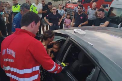 Araçta kilitli kalan çocuk camın kırılmasıyla kurtarıldı