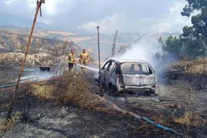 Bahçede başlayan yangında otomobil ve sera kullanılmaz hale geldi