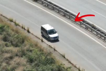 Otoyolda geri geri giden sürücü dron kamerasına yakalandı