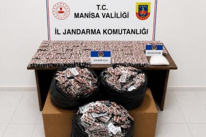 Otoyoldaki operasyonda bir araçta 59 bin adet hap ve 2 kiloya yakın uyuşturucu ele geçirildi