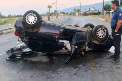 Ters dönen otomobildeki sürücü, sıkıştığı yerden kurtarıldı