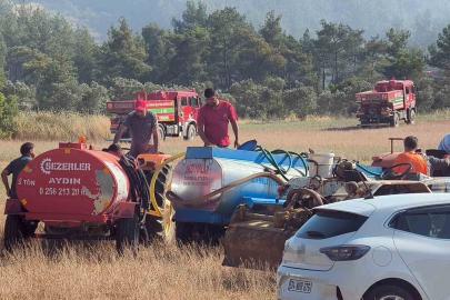 Traktörünü ve su tankerini alan yangına koştu