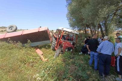 Buğday yüklü traktör devrildi, sürücü yaralandı