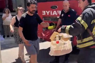 Mersin’de yangında mahsur kalan cennet papağanını itfaiye kurtardı