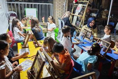 Minikler ilmek ilmek halı dokudu