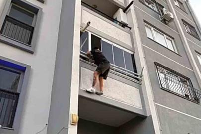 Uyuşturucu taciri balkondan sarkarken yakayı ele verdi