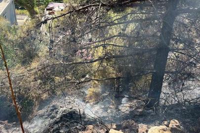 Alanya’da çalılık alanda çıkan yangın söndürüldü