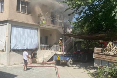 Erzin’de 2 katlı evde çıkan yangın büyümeden söndürüldü