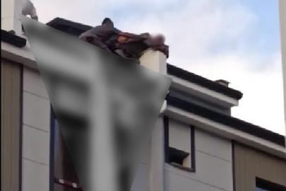 Eşiyle tartışıp çatıya çıkan genci Başkan son anda çekip aldı