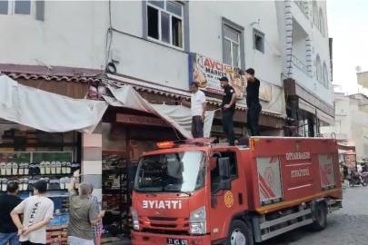 İş yerinde mahsur kalan kedi için itfaiye ekipleri seferber oldu