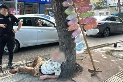 Pamuk şekerci sokak ortasında sızdı
