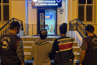 Firari kadın mutfaktaki gizli bölmede yakalandı