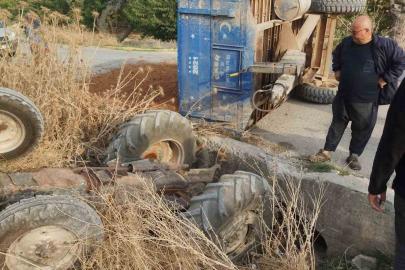 Toprak yüklü traktör dereye uçtu: 1 yaralı
